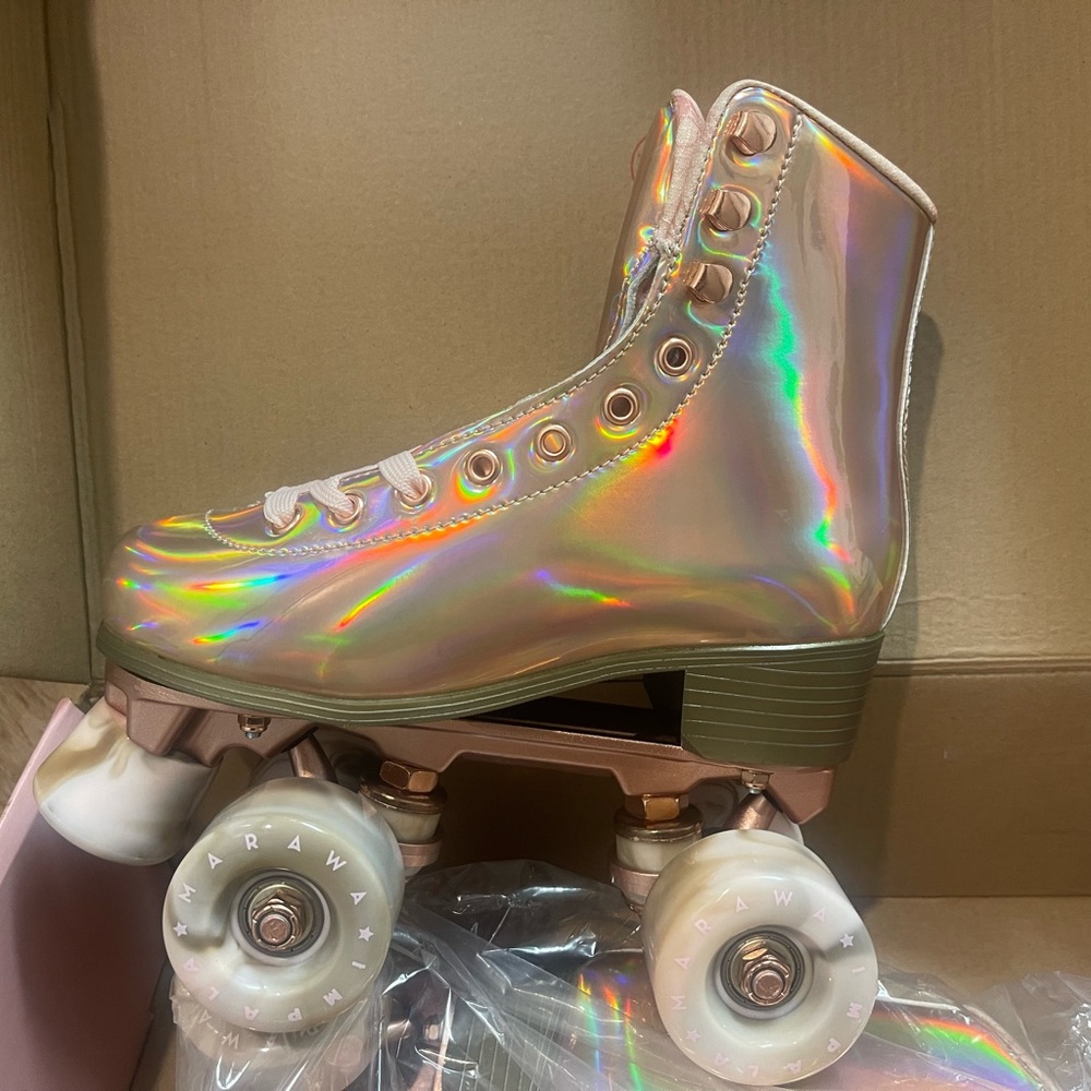 Rose Gold size 3 Impala roller skates